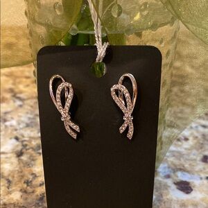 Swarovski elegant silver ribbon earrings measuring slightly over one inch.